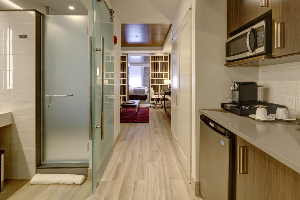 Image of Kitchen area, Living area, and Sleeping area in a Suite at The Brooklyn Hotel