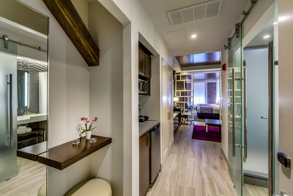 Image of long hallway from the bathroom to the sleeping area in a suite at The Brooklyn Hotel